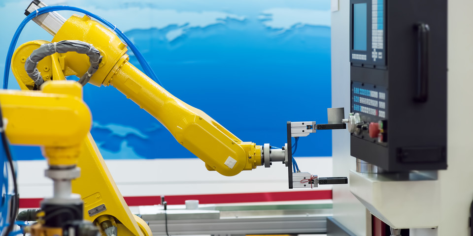 Robot arm at assembly line